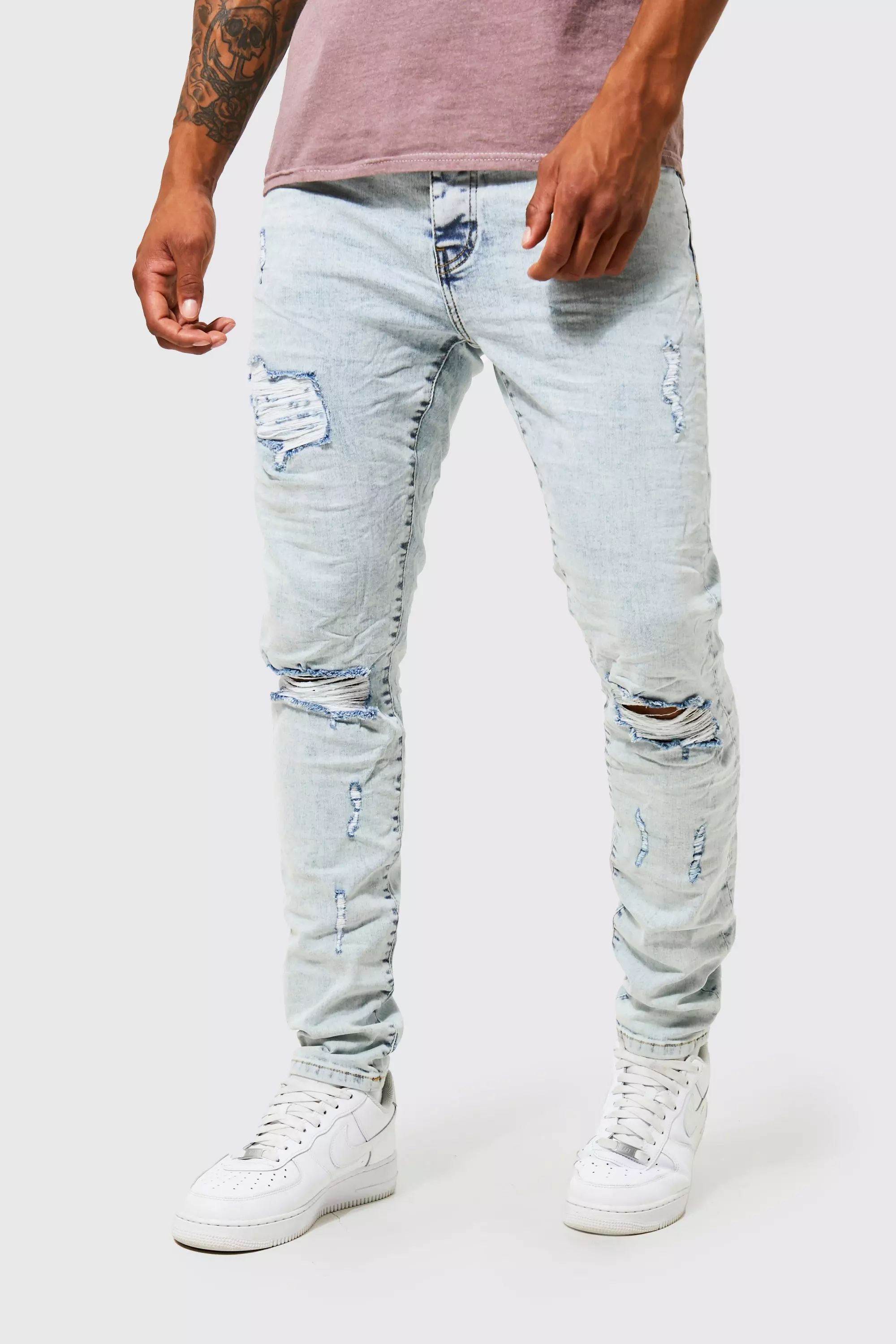 Mens stretch 2024 ripped jeans